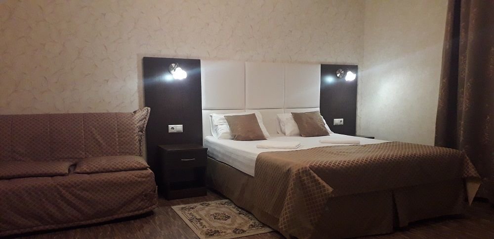 Кровать в общем номере Мини-Отель Strass