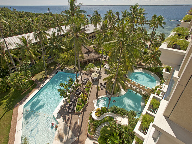 Кровать в общем номере Costabella Tropical Beach Hotel