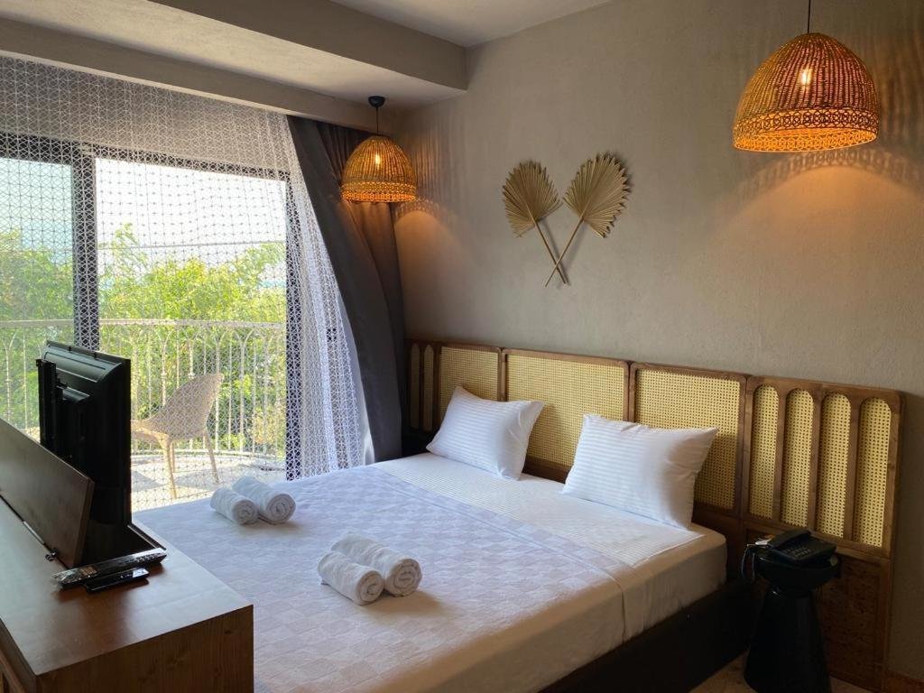 Deluxe Doppel Zimmer mit Balkon und mit Meerblick Icon Beach Suites Hotel Sovalye Island