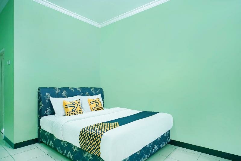 Standard room SPOT ON 2729 Marzan Syariah Guest House