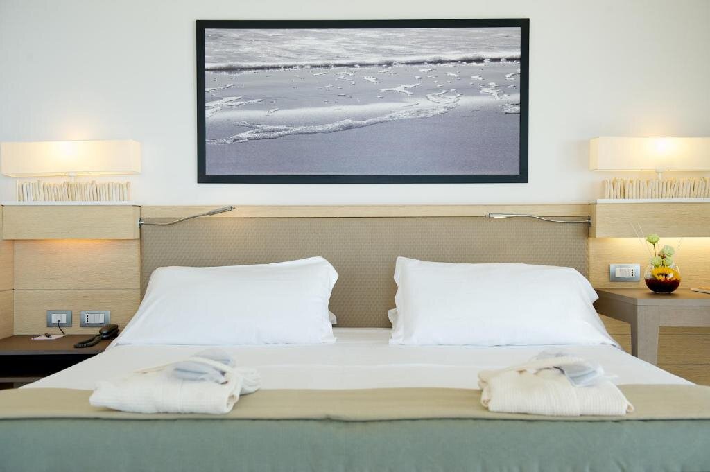 Standard Doppel Zimmer mit eingeschränktem Meerblick Capovaticano Resort Thalasso Spa