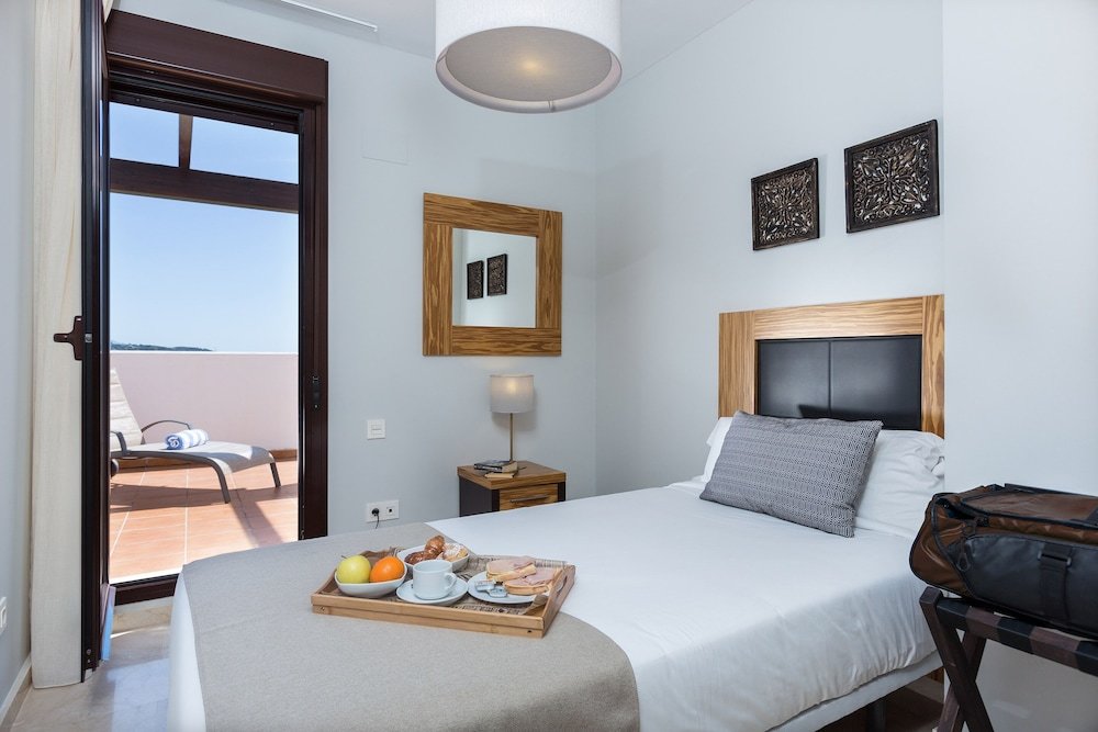 Habitación Estándar 2 dormitorios ático con balcón Ona Valle Romano Golf & Resort