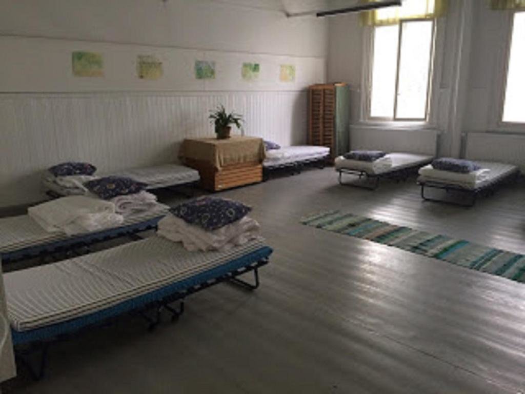 Кровать в общем номере Retkeilymaja Virkkula