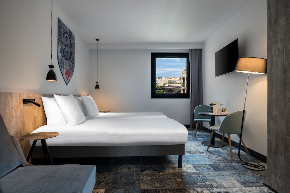 Premium Dreier Zimmer mit Stadtblick SOWELL HOTELS Les Chevaliers