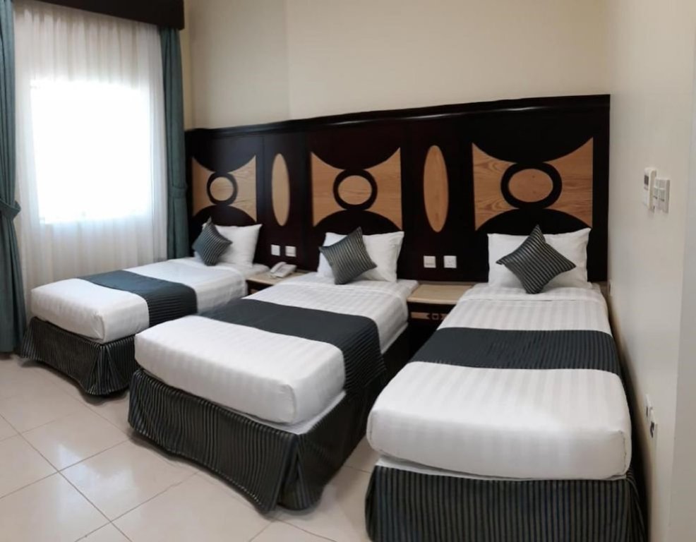 Standard triple chambre Diyar Almashaer Hotel