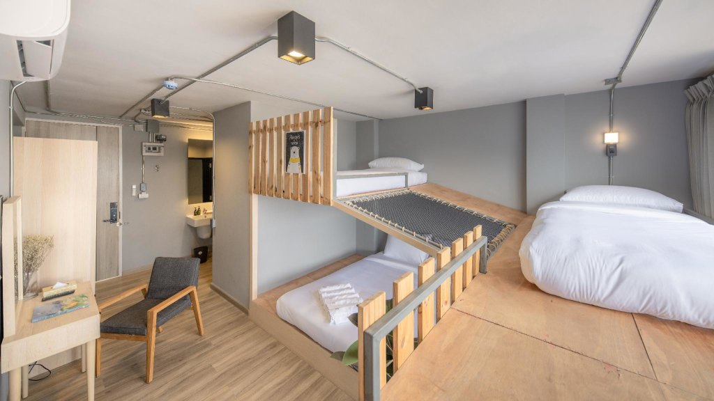 Cama en dormitorio compartido Arch39 Minimal Art & Craft Hotel