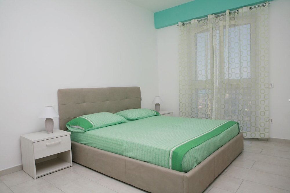 Standard Quadruple room with balcony and with sea view B&B Torre Nave