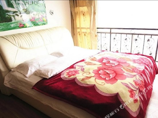 Кровать в общем номере Quanyou Hostel