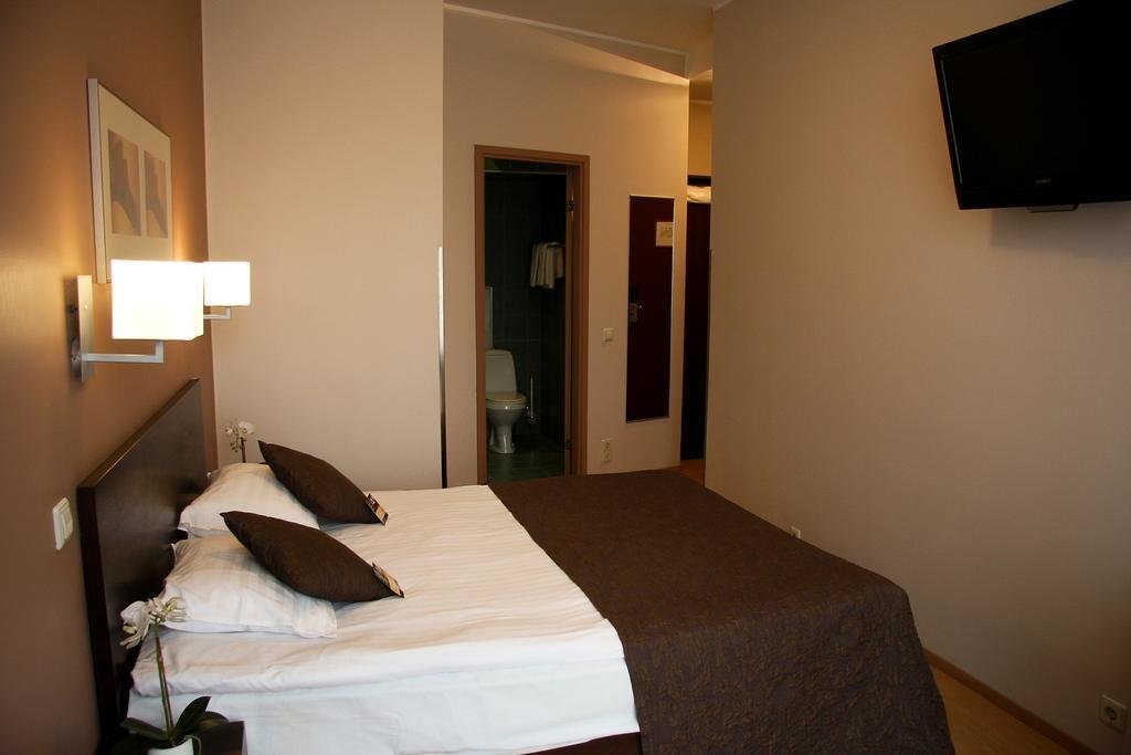 Кровать в общем номере City Hotel Tallinn by Unique Hotels