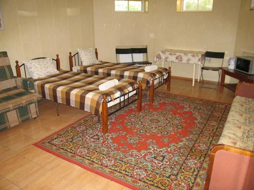 Économie quadruple chambre Motel Nadezhda