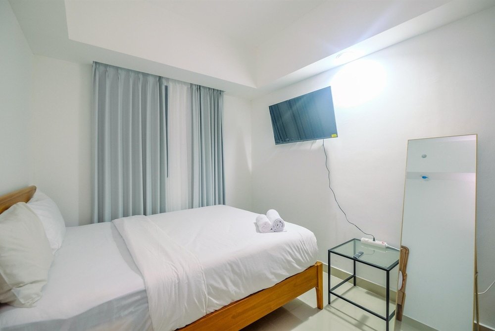 Camera Standard Comfort 1BR Apartment at Evenciio Margonda