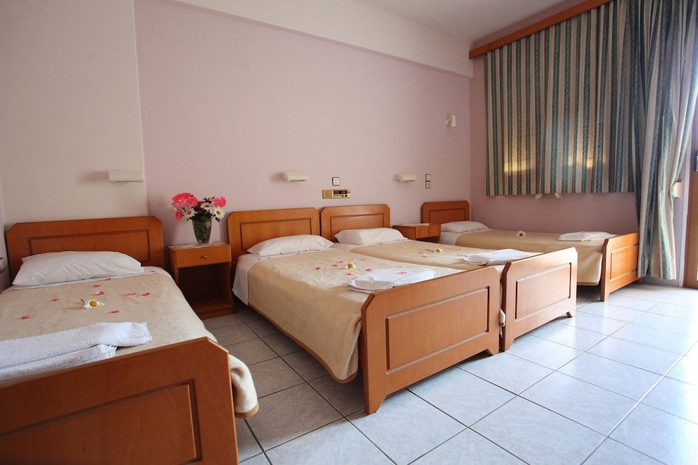 Standard quadruple chambre avec balcon Argiroupolis Maria Rooms