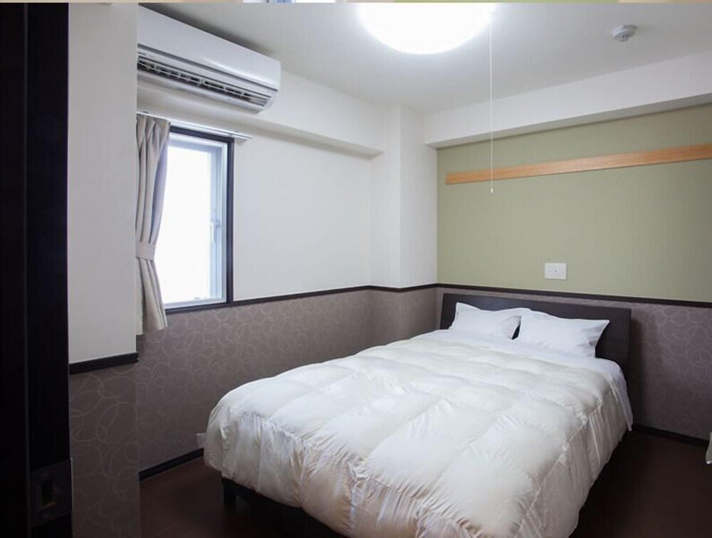 Номер Standard с балконом Condominium Resort Nago Grand Sedona