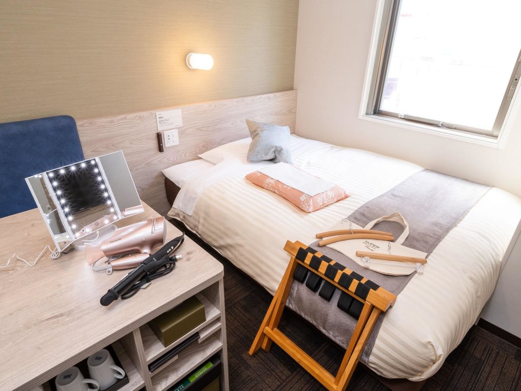 Кровать в общем номере (женский номер) Super Hotel Mitazono Sendai Airport