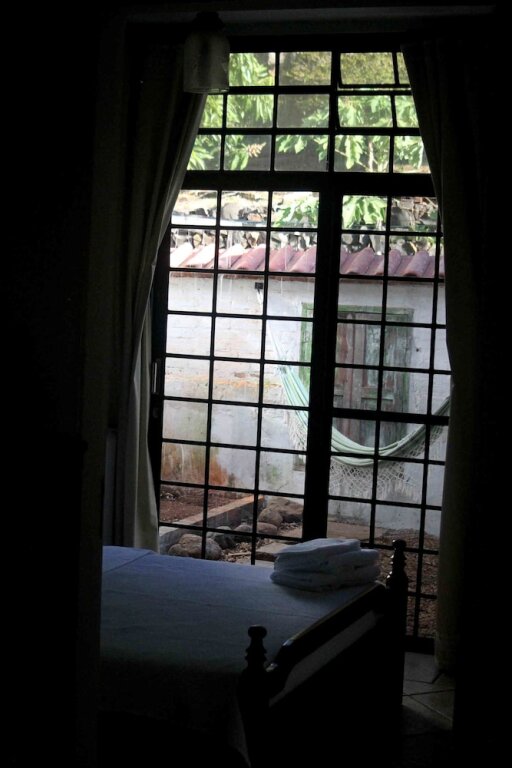 Двухместный номер Standard с балконом и с видом на сад Chácara Andó Bed And Breakfast