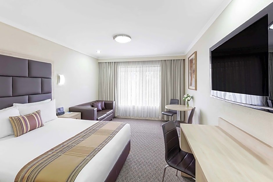 Executive Doppel Zimmer mit Poolblick Garden City Hotel, BW Signature Collection
