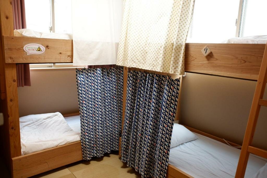 Cama en dormitorio compartido (dormitorio compartido masculino) Fukuoka Guest House Jikka