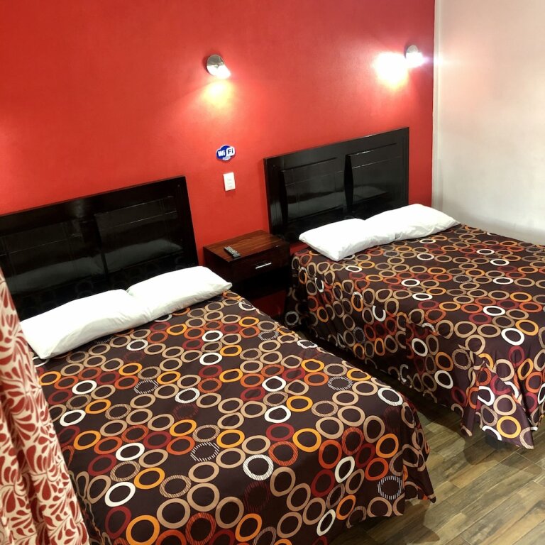 Четырёхместный номер Comfort HOTEL LA GRAN MANZANA