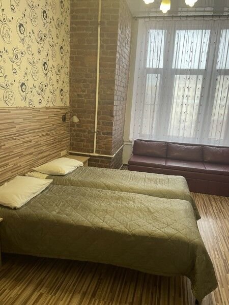 Кровать в общем номере Мой Отель