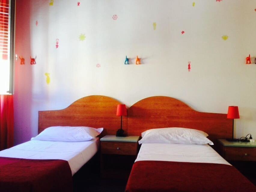 Cama en dormitorio compartido Hotel Galla