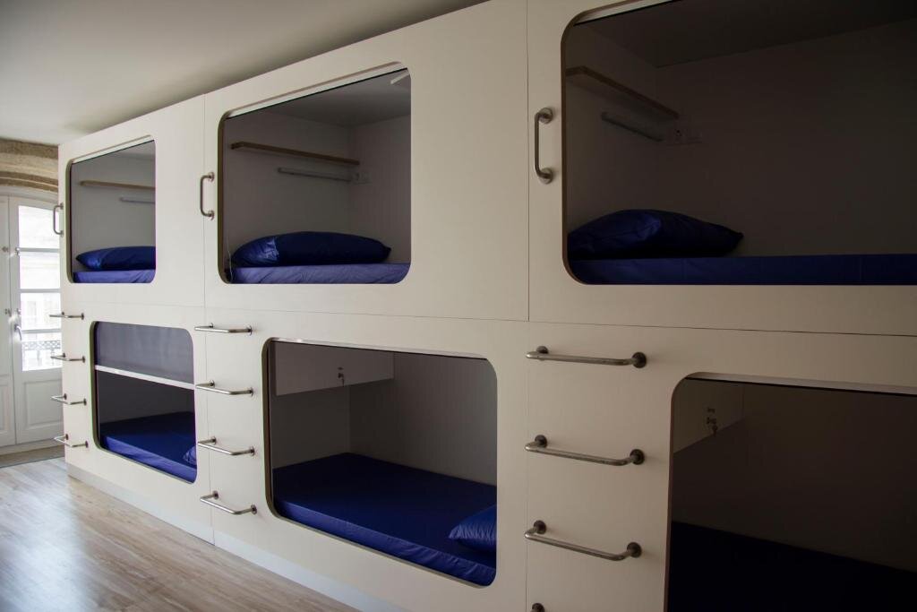Кровать в общем номере Hostel Cross