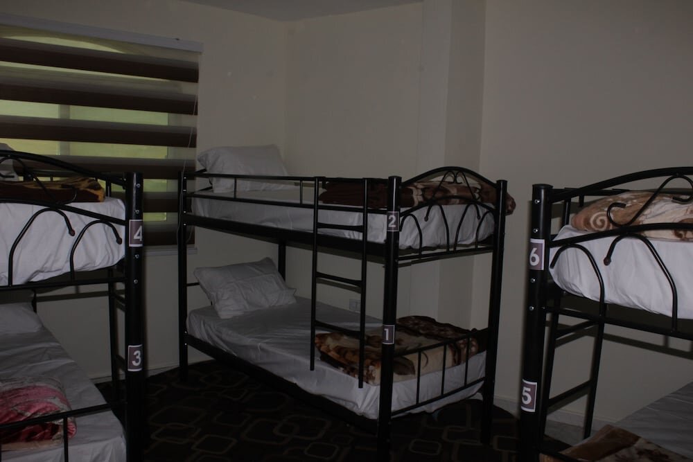 Кровать в общем номере (мужской номер) Alsultan Hostel
