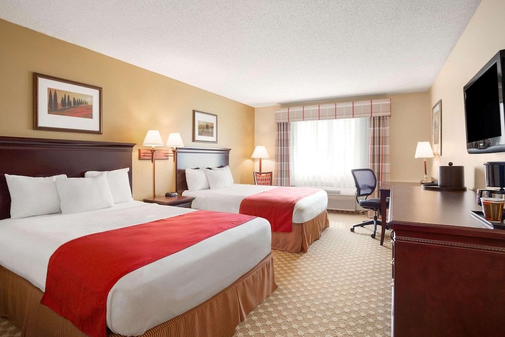Четырёхместный номер Standard Country Inn & Suites by Radisson, Lincoln North Hotel and Conference Center, NE