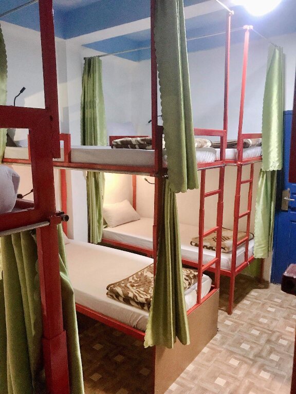 Кровать в общем номере Vang Vieng Freedom View Hostel