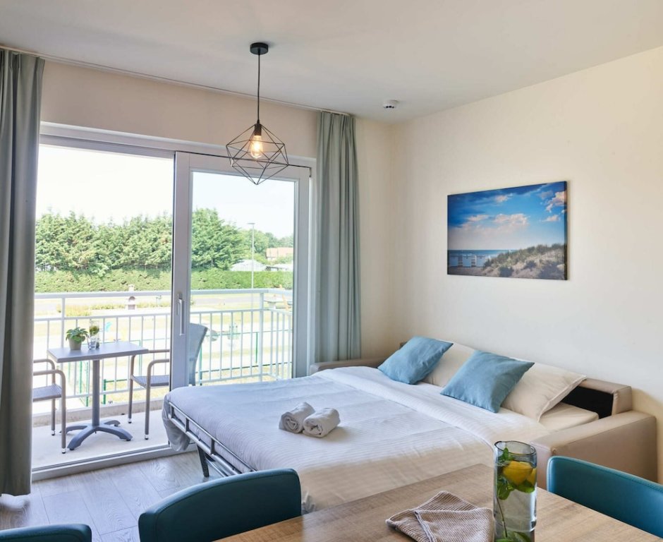 Triple Suite with balcony Holiday Suites Nieuwpoort