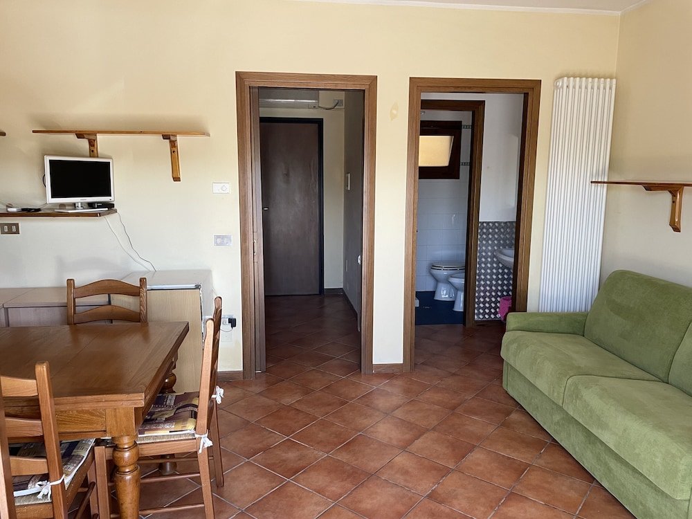 Апартаменты c 1 комнатой Apartment In Residence In Porto Levante Ro