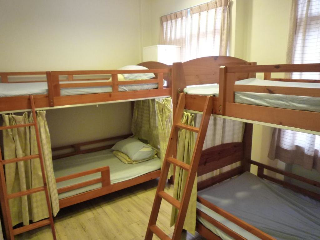 Кровать в общем номере Orinet-Jewel Youth Hostel