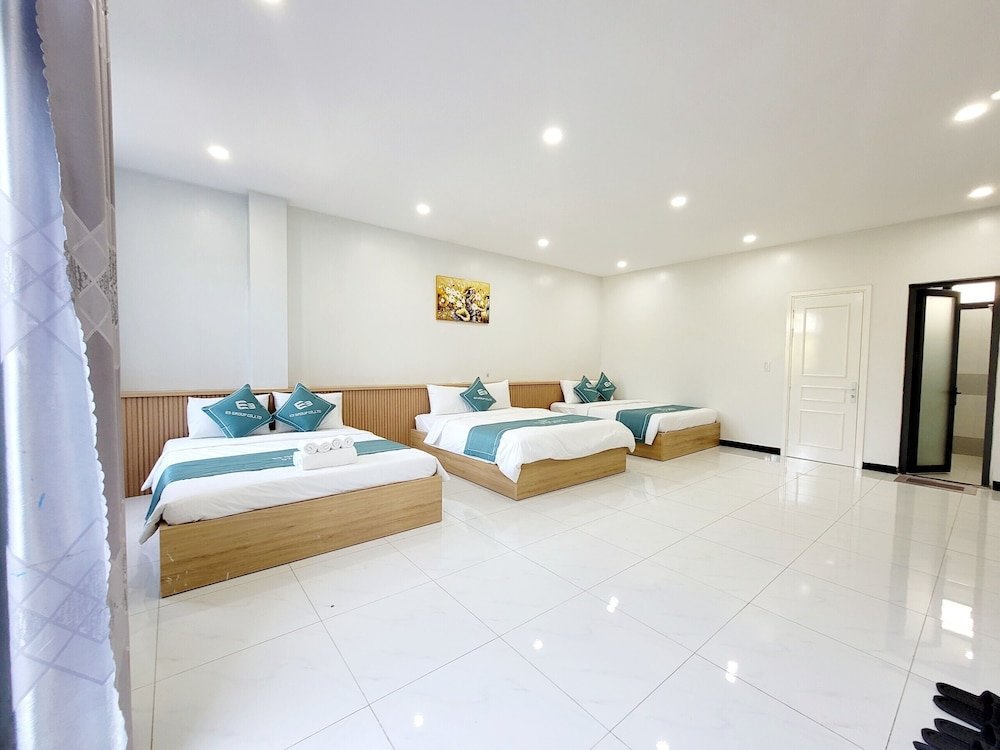 Standard triple famille chambre avec balcon E3 Homestay & Cafe - Grand World Phú Quốc