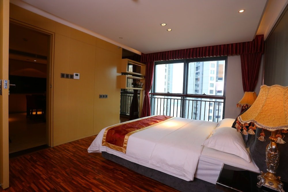 Deluxe Triple room with balcony HeeFun Apartment Hotel GZ Poly D Plaza