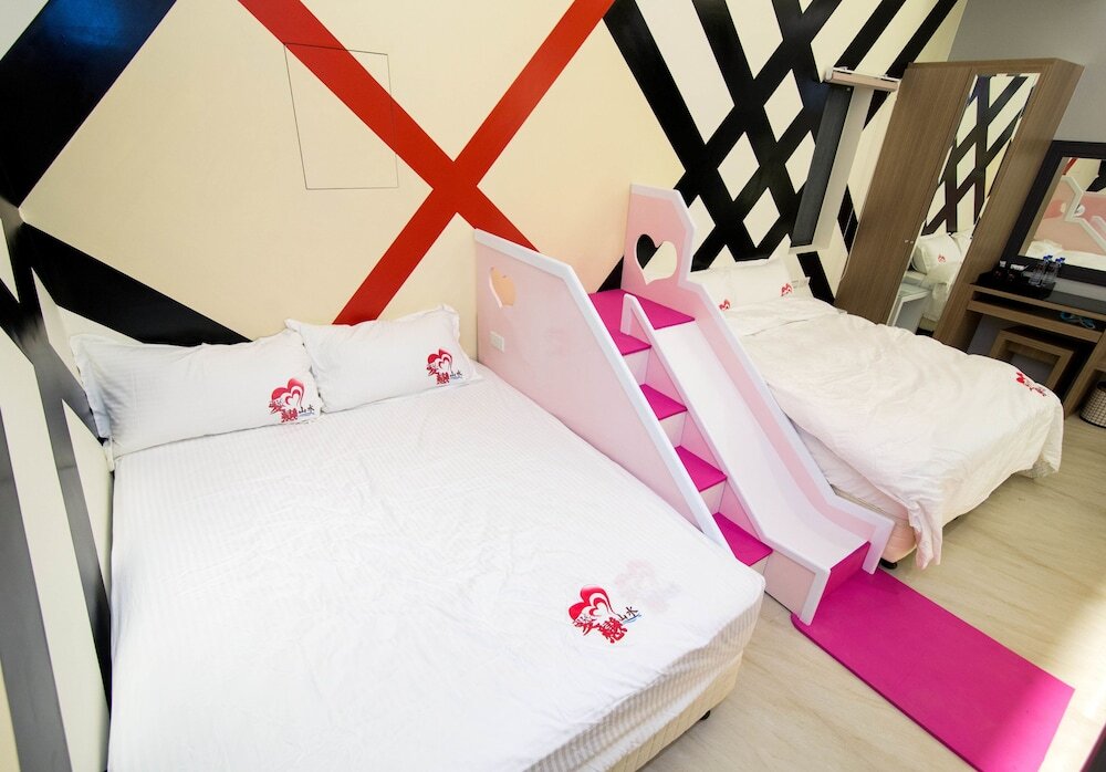 Confort quadruple chambre sous-sol Ai Lian Shan Shui Homestay