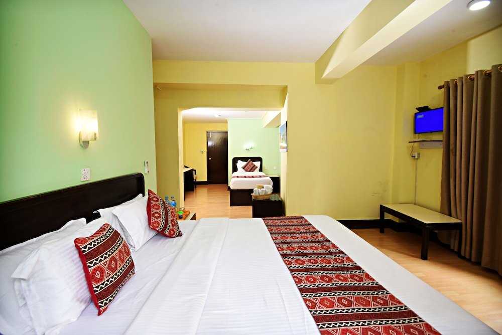 3 Bedrooms Standard Family room with balcony Sacred Boutique Hotel