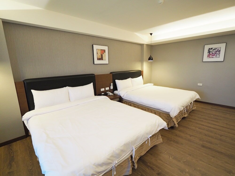 Standard quadruple chambre avec balcon Kailan Hotel