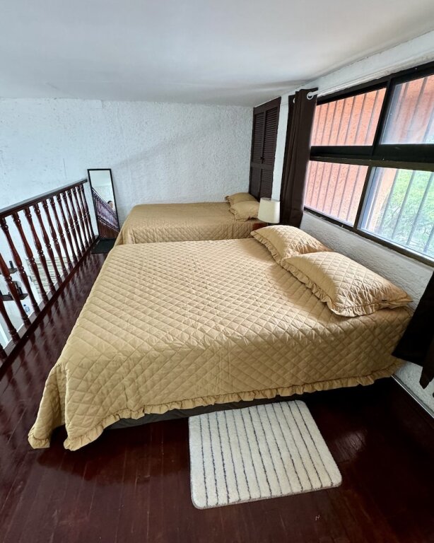 Семейный номер Standard дуплекс с балконом Cancún Suites Apartments - Hotel Zone