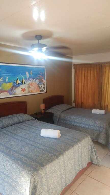 Confort quadruple chambre Hotel Nataro Inn