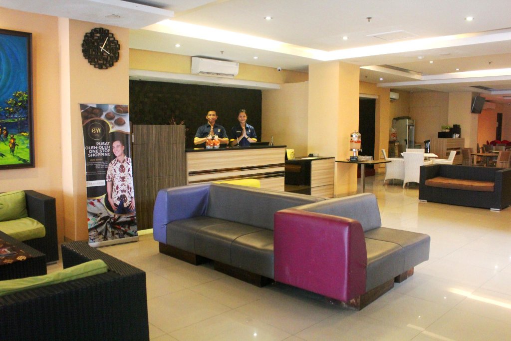 Кровать в общем номере Top Malioboro Hotel Jogja