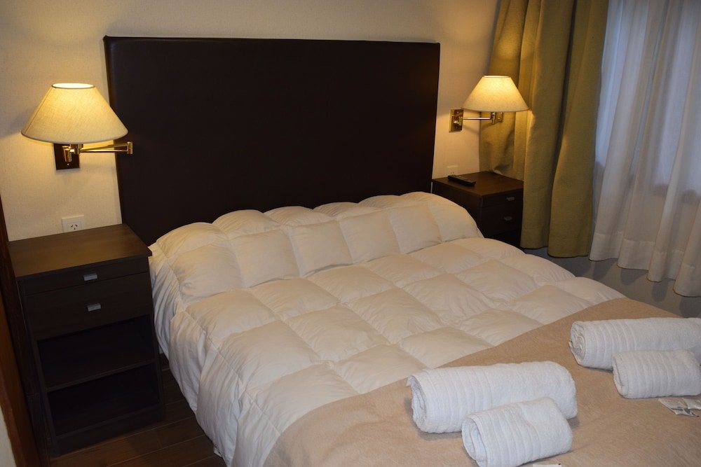 Cama en dormitorio compartido Hotel Nórdico