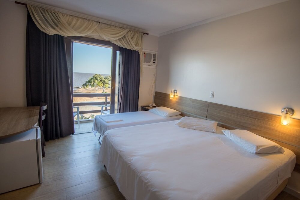 Luxe triple chambre Vue sur le lac Hotel das Figueiras