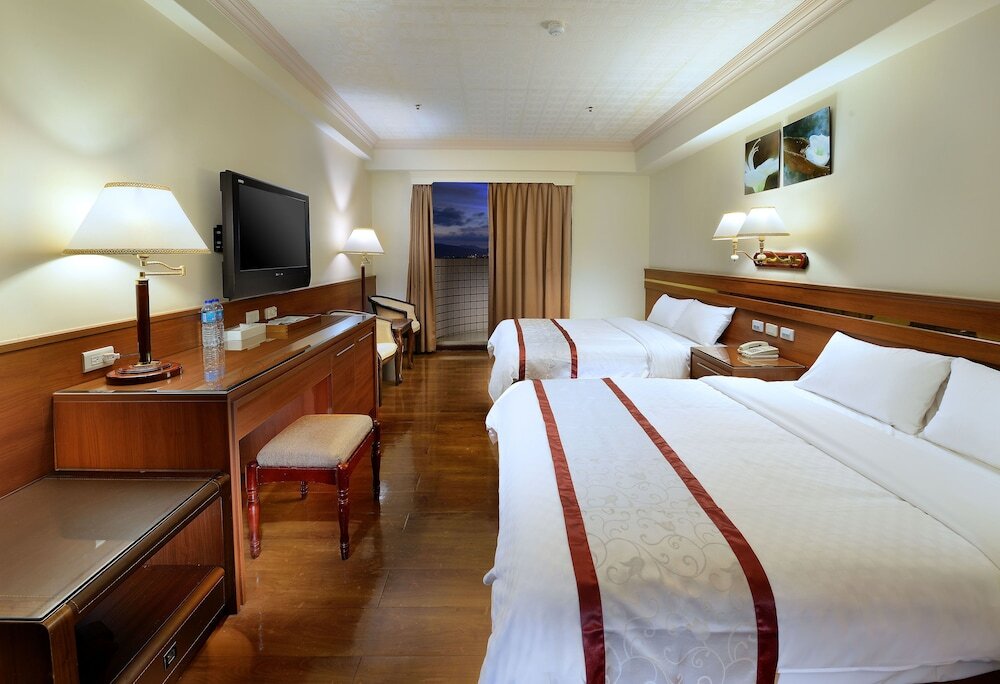 Standard quadruple chambre avec balcon Cheng Pao Hotel
