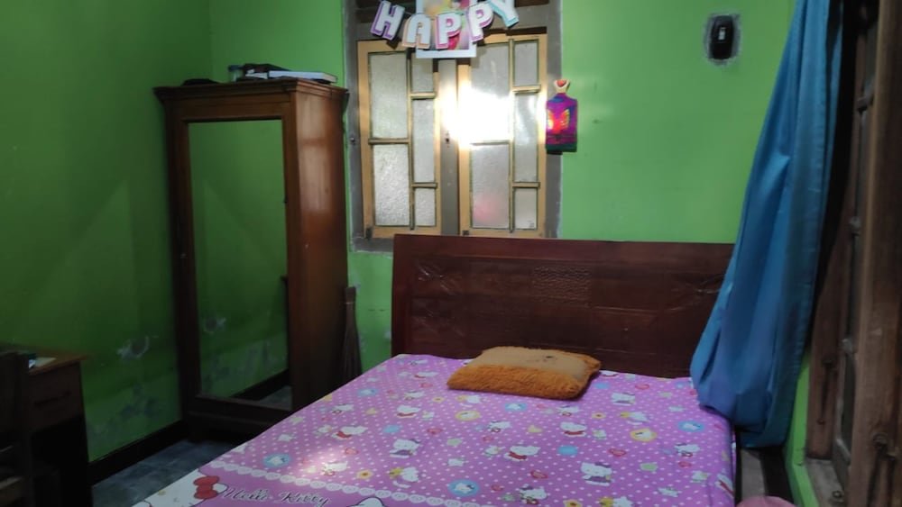 Кровать в общем номере Narti Homestay