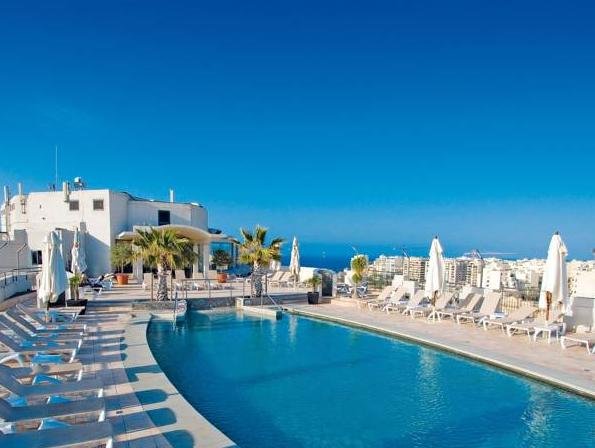 Кровать в общем номере с видом на море Malta Marriott Hotel & Spa