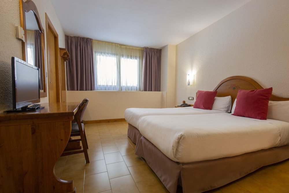 Standard quadruple chambre Hotel Sant Gothard