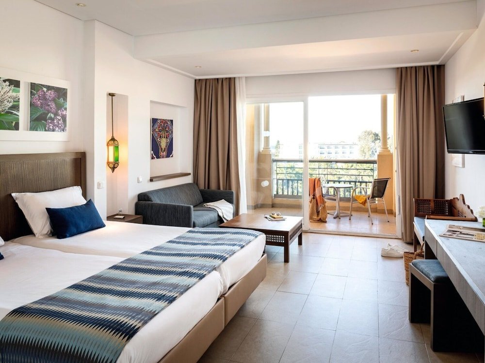 Standard Quadruple room with balcony and with garden view Royal Kenz Hotel Thalasso & Spa