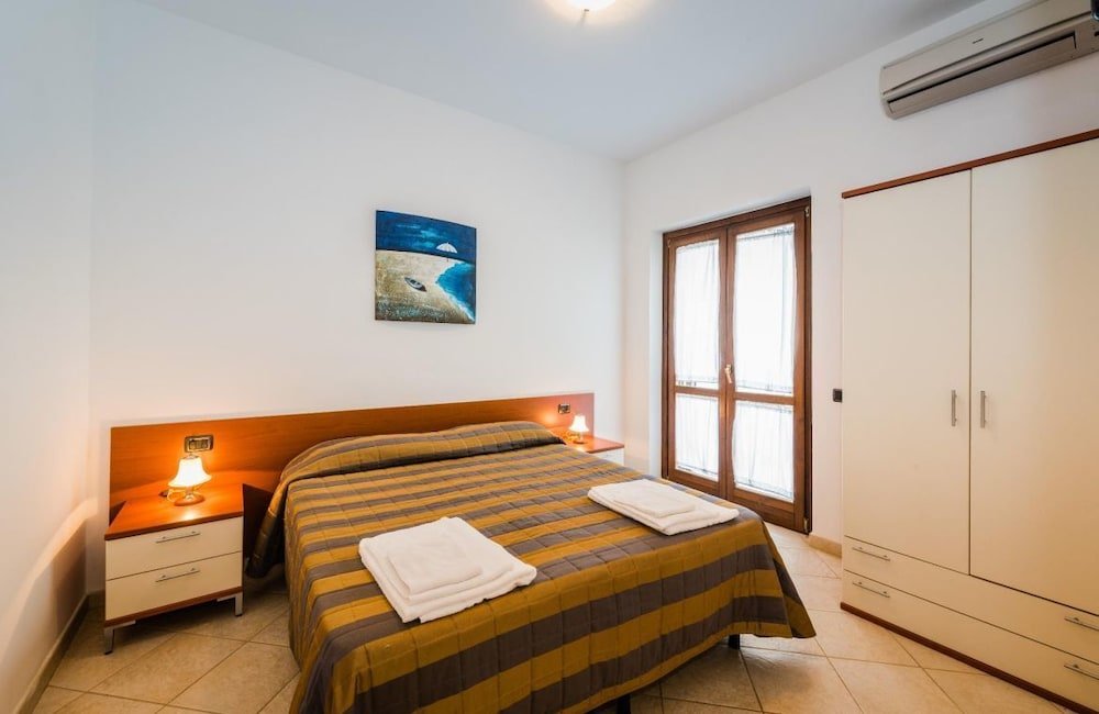 Апартаменты Standard с 2 комнатами с балконом и с видом на море Villaggio Punta Alice