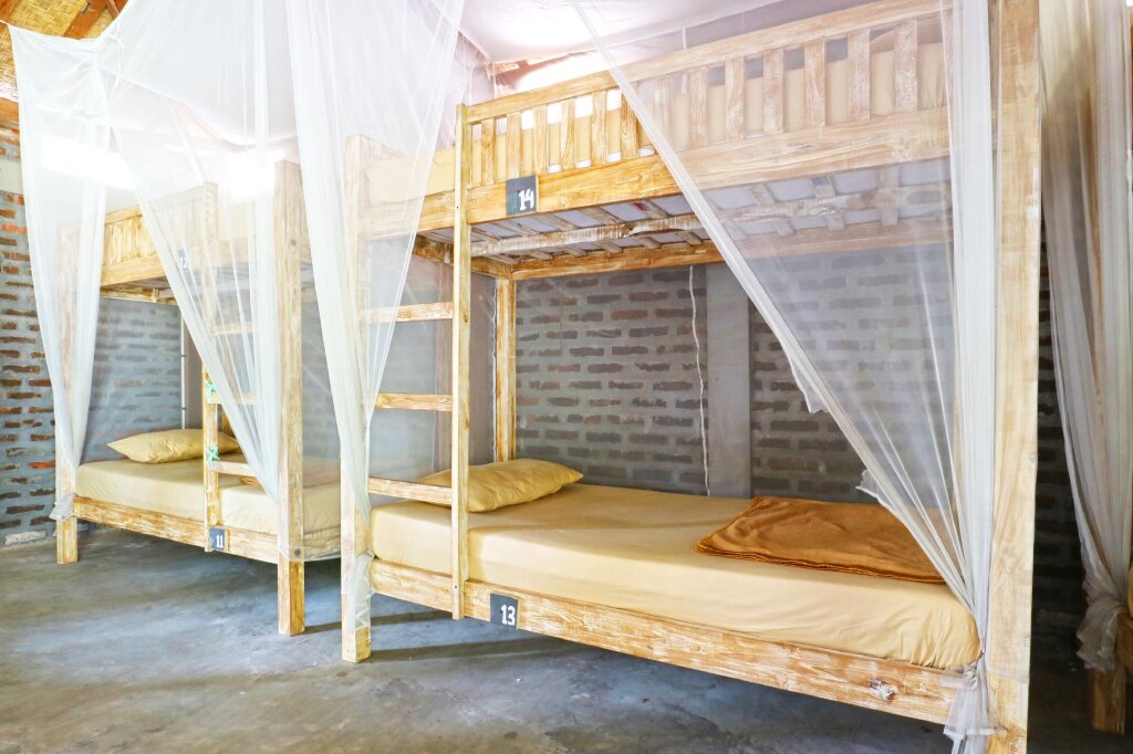Кровать в общем номере Indopurejoy House - Komala Indah Cottages