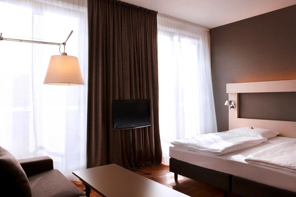 Апартаменты Comfort Hotel AMANO Rooms & Apartments