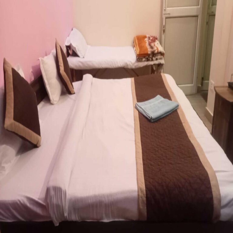 Deluxe room Triple one Hostels and Hotels